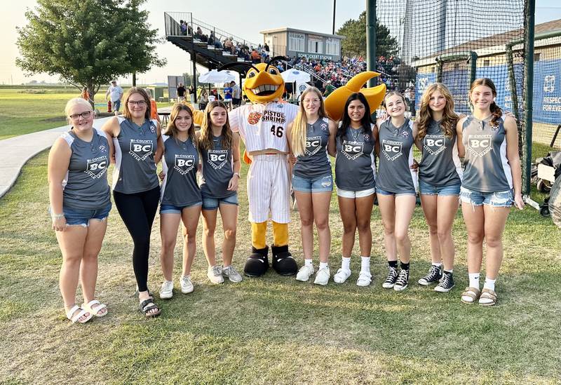 The Bi-County District champion Junior League All-Star softball team, which reached the state tournament, were recognized before the Pistol Shrimp game in Peru on Thursday, Aug. 1. Team members, who were joined by the Pistol Shrimp mascot, are Avery Sherman (from left), Myah Richardson, Alexis Margis, Sarah Schennum, Piper Terando, Britney Trinidad, Paige Tonioni, Chloe Parcher and Kennedy Holocker.