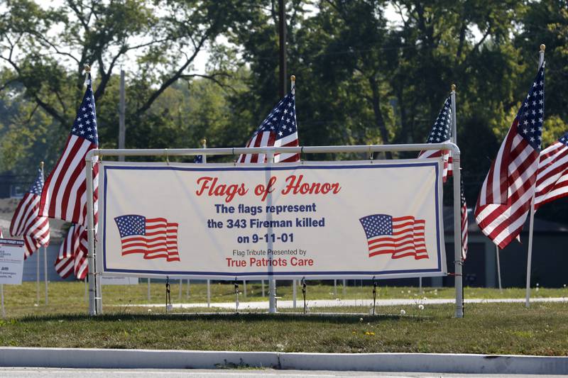 American flags, put up by True Patriots Care, surround McHenry Township Fire Protection District Station 2 on Johnsburg Road in Johnsburg on Thursday, Sept. 11, 2025. The Flags of Honor is on  display at Station 2 through September 15. This exhibit honors the 343 brave firefighters who lost their lives during the tragic events of September 11, 2001, with each flag symbolizing their courage and sacrifice.