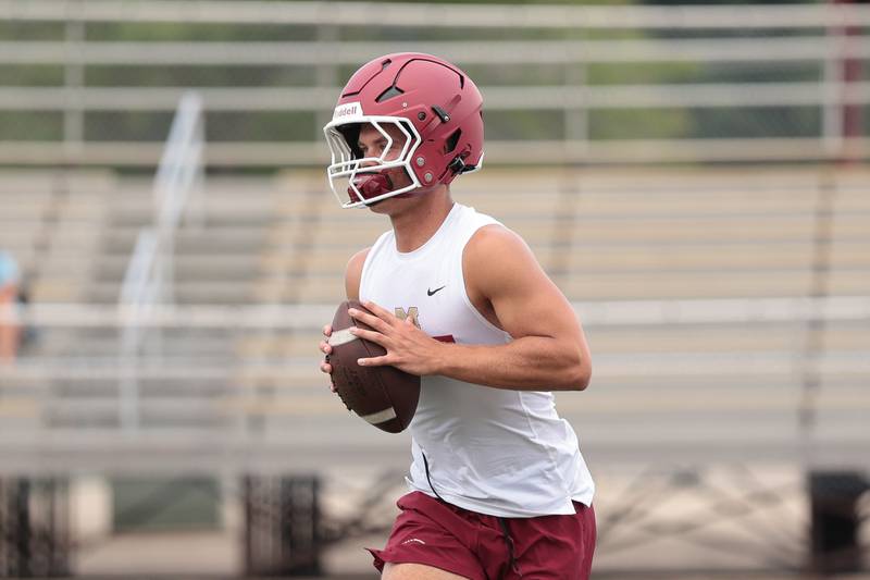 Morris' Brady Varner looks to pass against Dwight at Morris' 7-on-7 scrimmage on Tuesday, July 8, 2025 in Morris.
