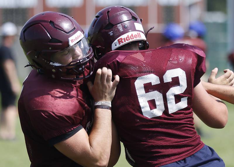 Marengo’s Brady Kentgen blocks Ryan Grismer drill during football practice on Tuesday, July 22,  2025, at Marengo High School.