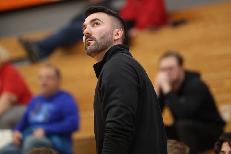 Lincoln-Way Central head coach Evan Wyllie checks the scoreboard during the game against Lemont in the Lincoln-Way West Warrior Showdown on Saturday January 28th, 2023.