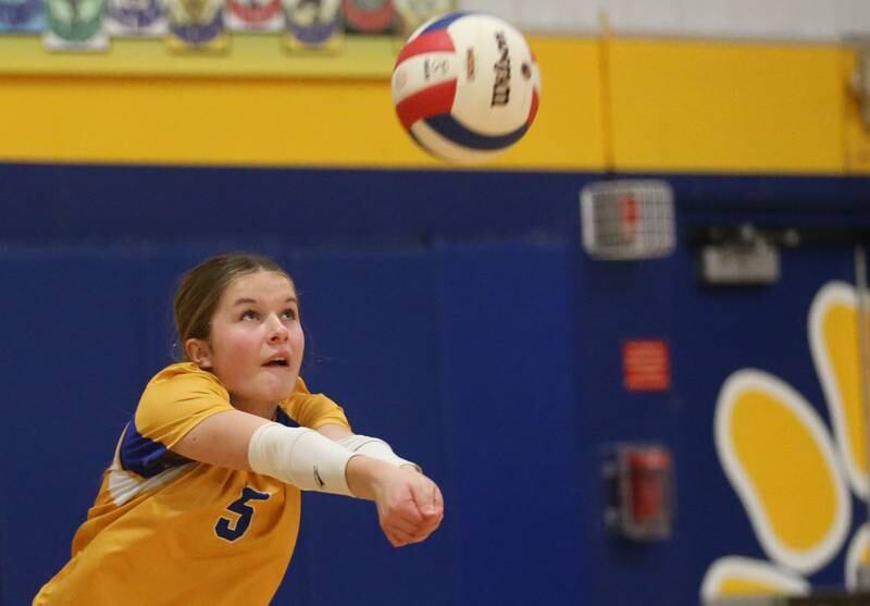 Logan's Collyns Etheridge returns a serve from Rockford-Marshall during the IESA Class 3A eighth-grade Regional final game on Thursday, March 13, 2025 at Logan Junior High School in Princeton.