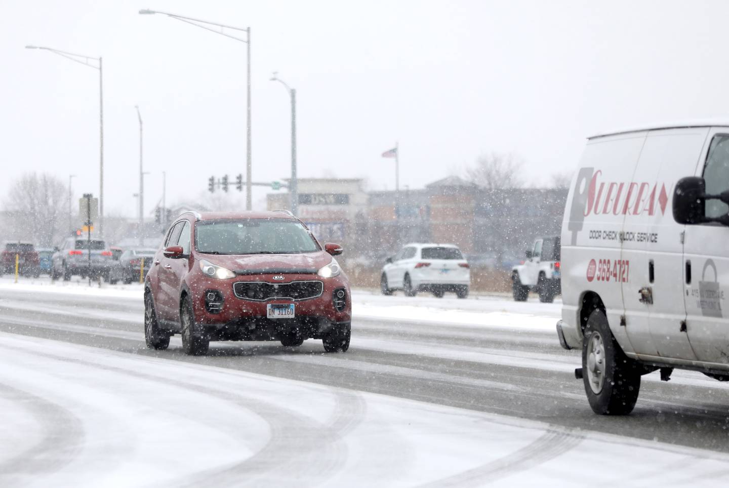 Snow falls on Randall Road in St. Charles on Thursday, Dec. 22, 2022.