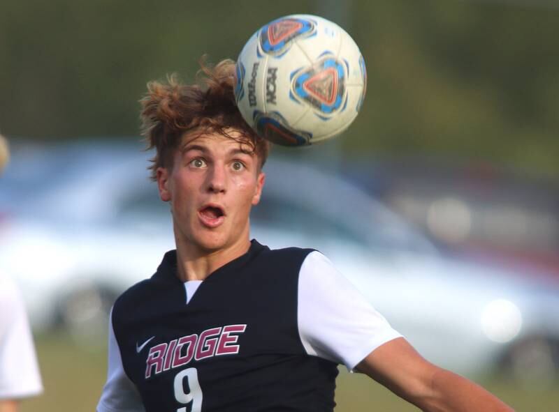 Prairie Ridge’s Henry Knoll  keeps an eye on the ball against Crystal Lake South in varsity soccer on Thursday, Sept. 19, 2024, at Prairie Ridge High School in Crystal Lake.