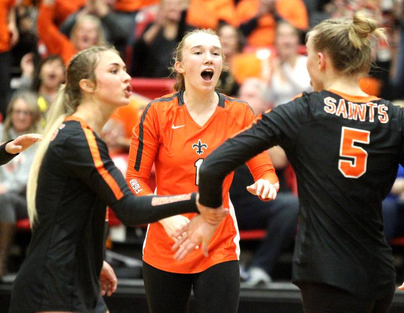 St. Charles East’s (center) celebrates with her team during a post-season game against Willowbrook on Nov. 2, 2022. Lia is the 2022 Kane County Chronicle Girls Volleyball Player of the Year.