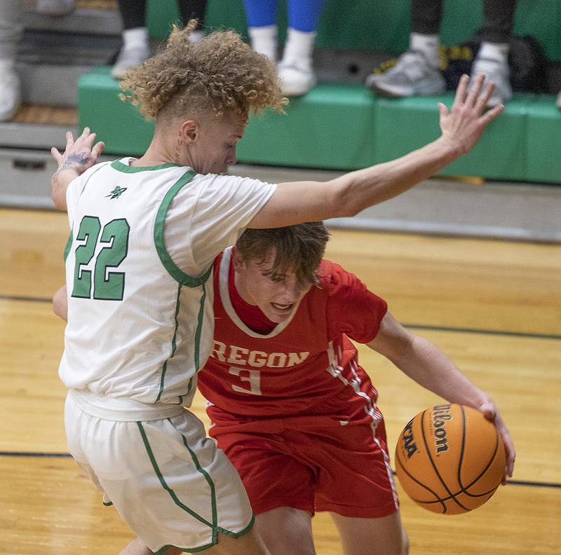 Oregon’s Cooper Johnson works against Rock Falls’ Nehemiah Menendez Friday, Jan. 10, 2025 at Rock Falls High School.