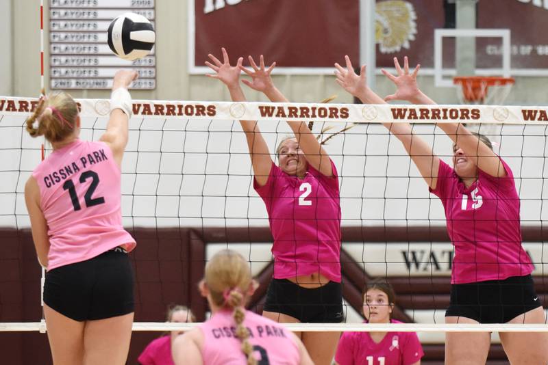 Watseka's Christa Holohan, center, and Gabby Kohl, right, look to block a hit from Cissna Park's Josie Neukomm during a game at Watseka Tuesday, Oct. 21, 2025.