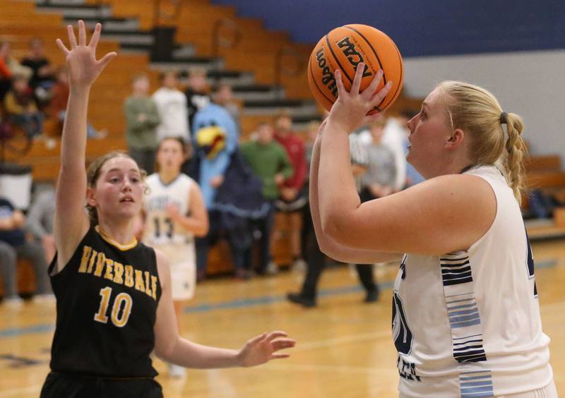 Bureau Valley's Emma Stull eyes the hoop as Riverdale's Molly Skahill guards during the Thanksgiving Tournament on Wednesday, Nov. 20, 2024 at Bureau Valley High School.