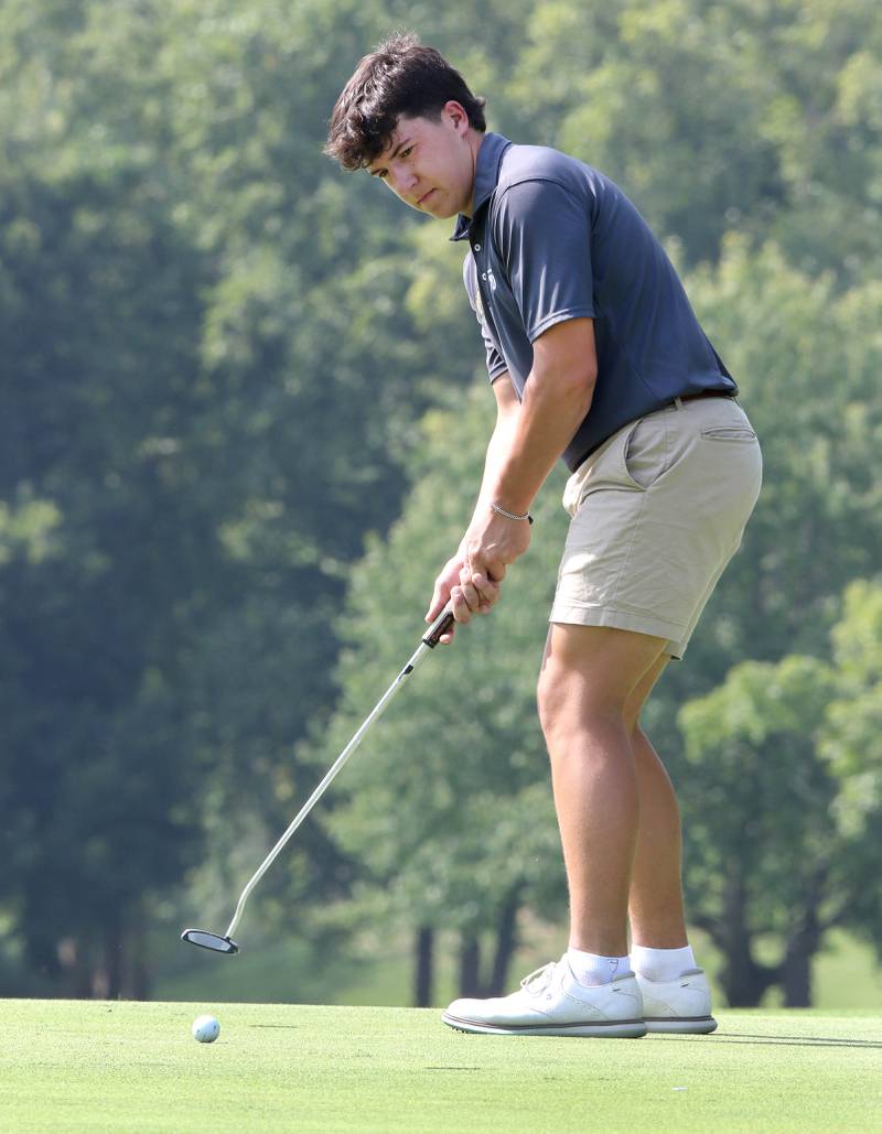 Sycamore’s Luther Swedberg putts on the eighteenth green during the Mark Rolfing Cup Monday, Aug. 21, 2023, at the Kishwaukee Country Club in DeKalb.