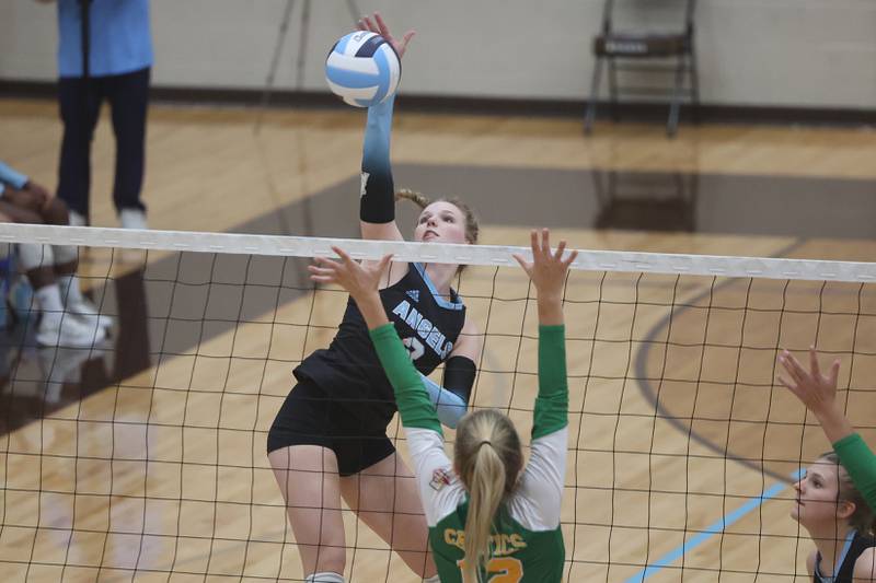 Joliet Catholic’s Brooke Simon hits a shot against Providence on Thursday, Sept. 14, in Joliet.