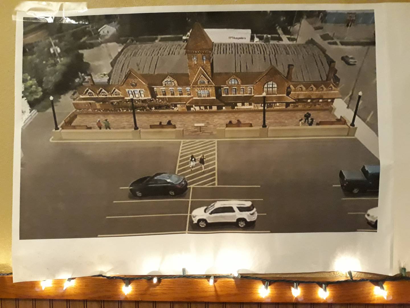 An illustration shows what the promenade and lighting designed around the Mendota Union Depot mural will look like.