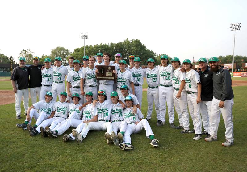 York players pose for a photo following their Class 4A Kane County Supersectional win against Hononegah at Northwestern Medicine Field in Geneva on Monday, June 5, 2023.