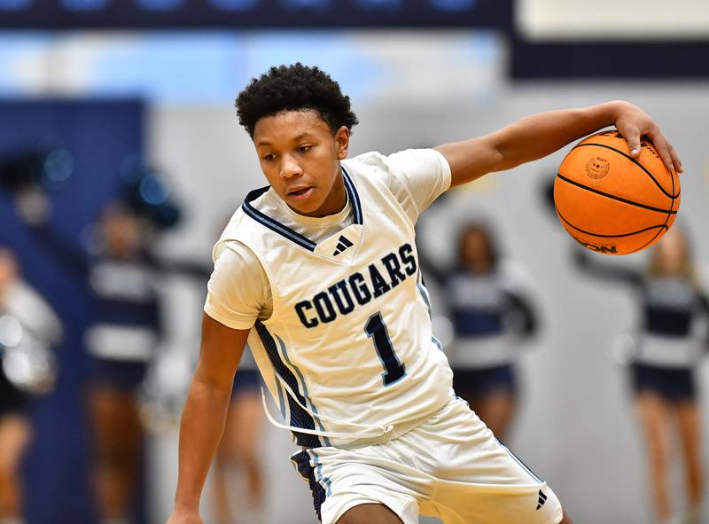 Plainfield South's Ayden Foston handles the ball during the conference game against Joliet West on Friday, DEC. 05, 2025, at Plainfield.