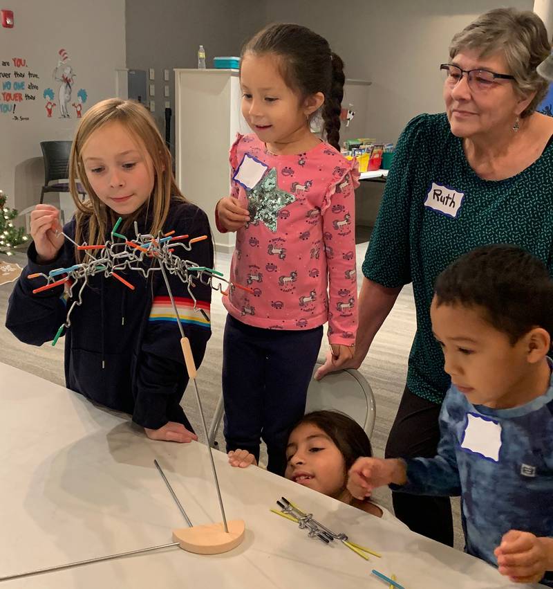 Neighbors' House providing learning activities and board games with a 2022 Promise Grant