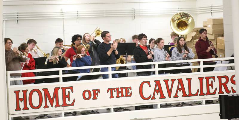 Members of the L-P band perform in the balcony during the game between L-P and Morris on Friday, Dec. 6, 2024 in Sellett Gymnasium at L-P High School.