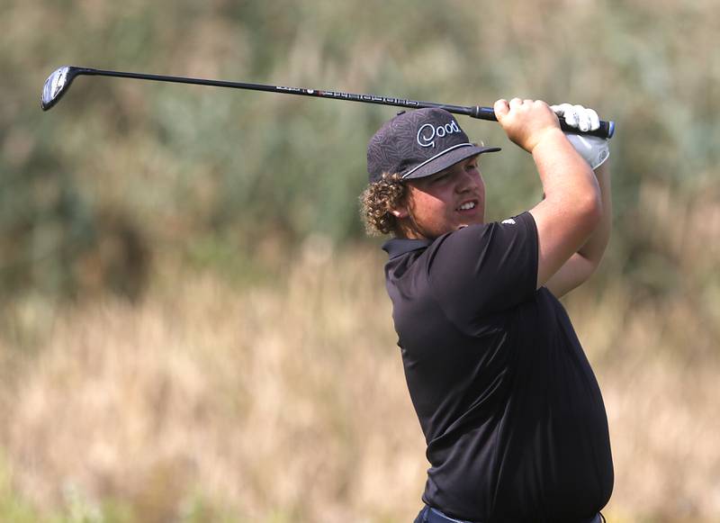 Sandwich’s Kai Kern watches his tee shot on the seventh hole during the IHSA Class 2A Crystal Lake South Boys Golf Regional on Wednesday, Oct. 1, 2025 at RedTail Golf Club in Lakewood.