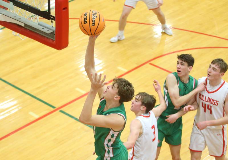 L-P's Braylin Bond eyes the hoop after dribbling in the lane past Streator's Nolan Ketcham during the Class 3A Regional title game on Friday, Feb. 28, 2025 in Sellett Gymnasium at L-P High School.