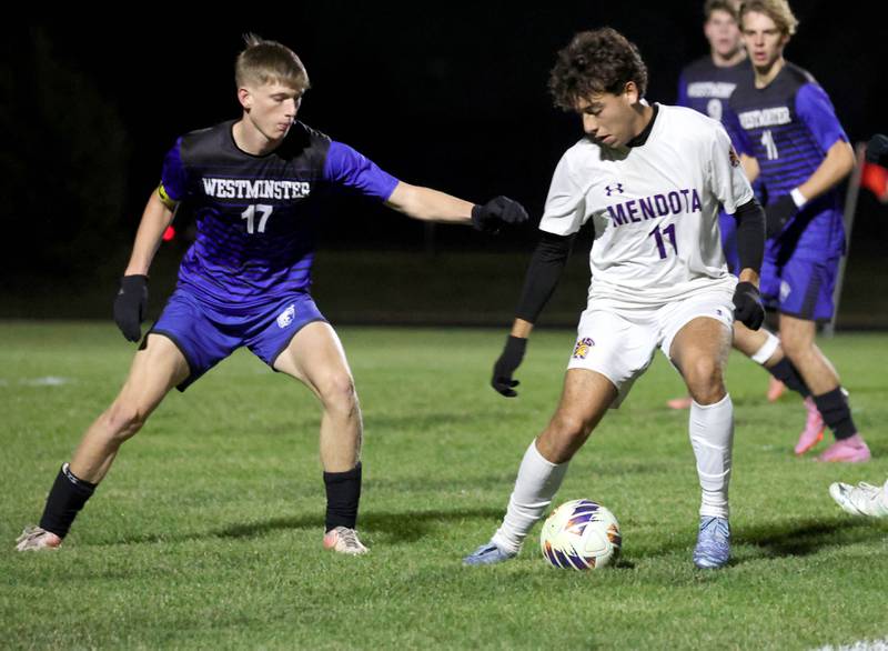Mendota's Cesar Casas tries to keep the ball away from Harvest-Westminster's Jake Arnold Friday, Oct. 31, 2025, during the Class 1A Indian Creek Sectional championship game Friday in Waterman.