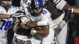 Photos: Lincoln-Way East, Mount Carmel football meet in playoffs