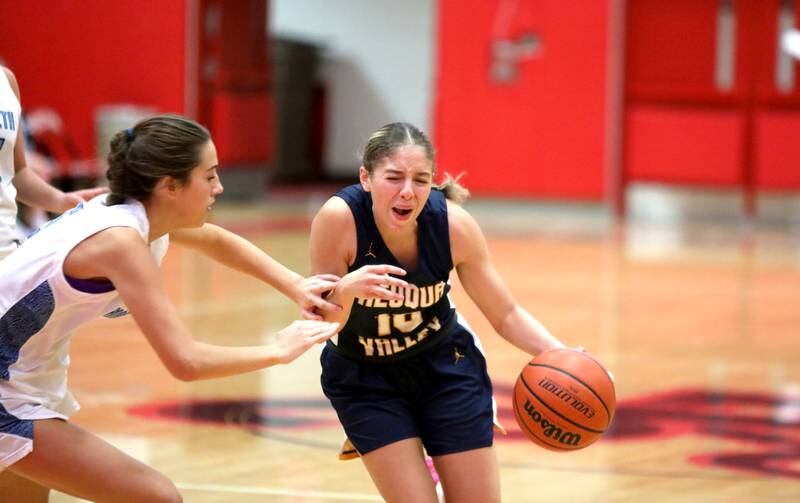 Neuqua Valley’s Zoe Navarro drives toward the basket during a game against Nazareth at Hinsdale Central on Thursday, Nov. 16, 2023.