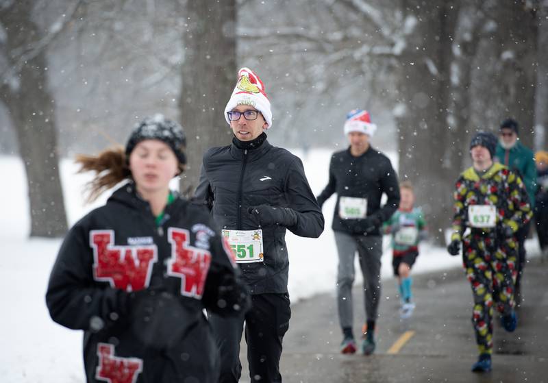 Brandon Chiero, of Kankakee, runs along the river at Kankakee Community College for the 35th annual Jingle Bell Run on Sunday, December 7, 2025.