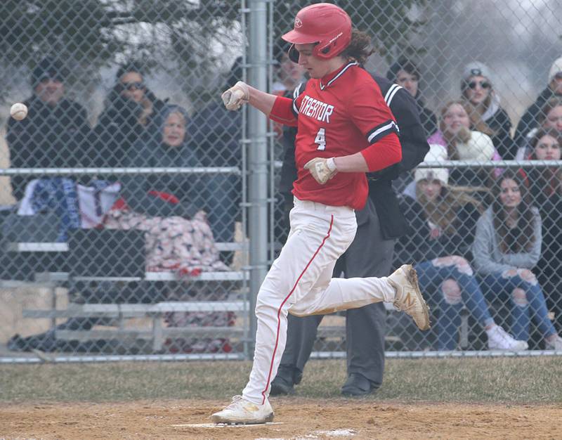 Streator's Noah Camp scores a run against Woodland/Flanagan-Cornell on Wednesday, March 15, 2023 at Woodland High School.
