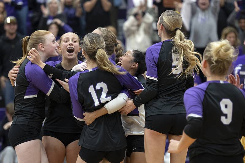 The Dixon Duchesses celebrate their two-set win over Morris Thursday, Oct. 31, 2024 in the class 3A regional championship at Dixon High School.