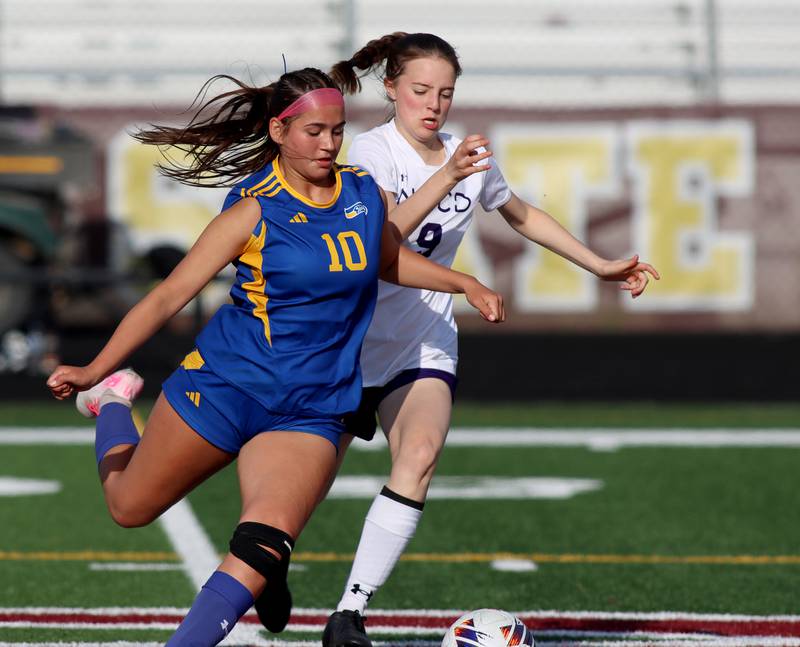 Johnsburg’s London Baidinger, left, races North Shore Country Day’s Alexia Conine for the ball  in IHSA Class 1A Sectional Title Game action at Richmond-Burton High School in Richmond on Tuesday, May 27, 2025.