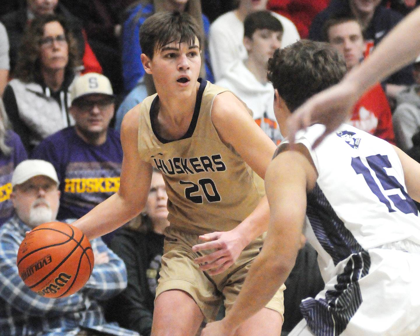 Serena's Beau Raikes dribbles as Lexington's Johnny Grunloh defends in the Marquette Christmas Tournament championship game on Friday, Dec. 28, 2023.