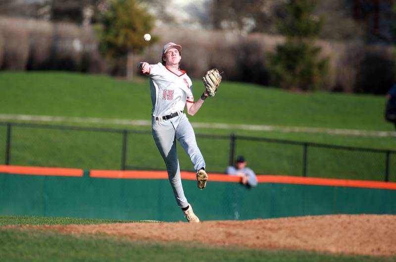 St. Charles East's Nathan Moline throws to first base during a game against Wheaton North on Wednesday, April 23, 2025 in St. Charles.