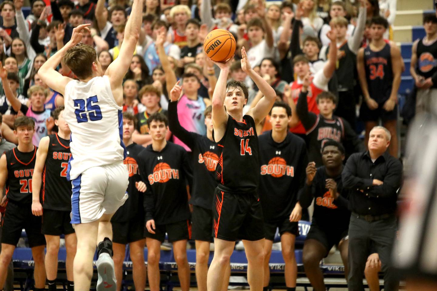 Wheaton Warrenville South’s Sean Doherty shoots a game-tying basket during a game on Friday, Jan. 24, 2025 at Geneva.