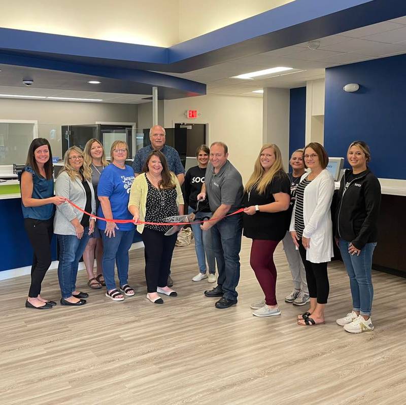 The Streator Chamber of Commerce conducted a ribbon cutting ceremony at SOCU for its grand reopening. Pictured are (left to right) Courtney Levy (executive director of the chamber), Rebecca Underhill (SOCU), Dana Stillwell (chamber board and SOCU), Kris Cox (SOCU), Tara Bedei (Streator mayor), Dave Plymann (Chamber board and city manager), McKayla Harcar (SOCU), Doug Patterson (CEO of SOCU), Megan Wright (member services coordinator of the chamber), Cindy Cameron (chamber ambassador), Sue Svdgovich (SOCU) and Hillary Cinotto (SOCU).