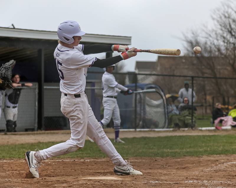 Plano's Nathan Tunt (15) hits a shot off the end of the bat during baseball game between Sandwich at Plano on Thursday, April 9, 2025 in Plano.