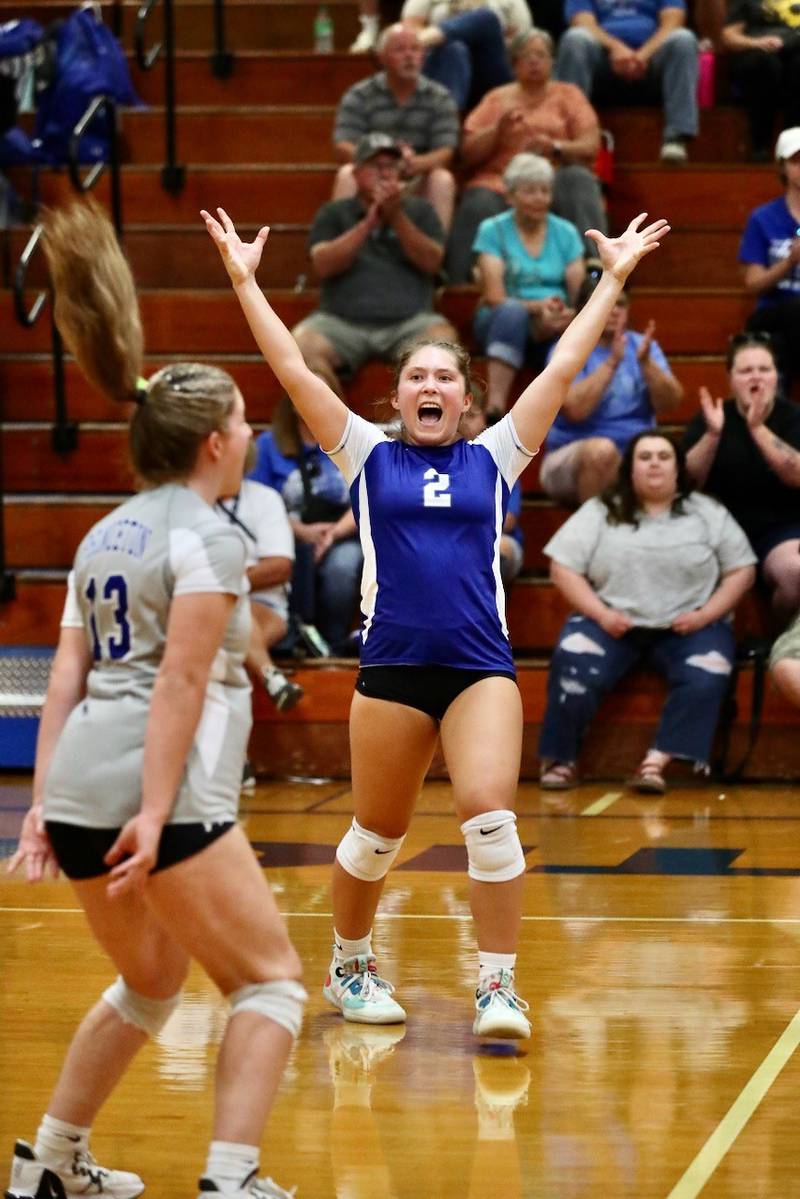 Miyah Fox celebrates a Princeton point against Hall Tuesday night at Prouty Gym. The Tigresses won 25-11, 25-20.