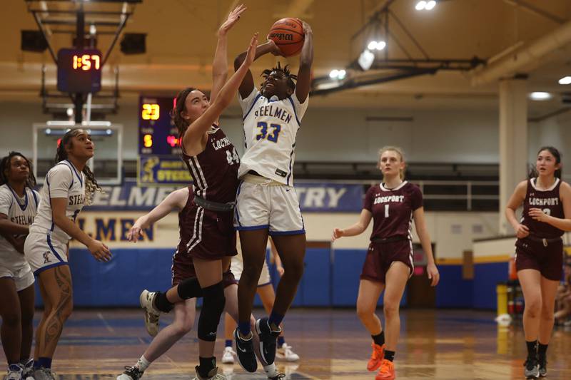 Joliet Central’s Aubrey Weems puts up a shot against Lockport.