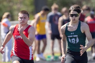 Marco Rizzi competes for St. Bede during the 100mm sprint during the Rollie Morris Invite at Hall High School on April 13, 2024.