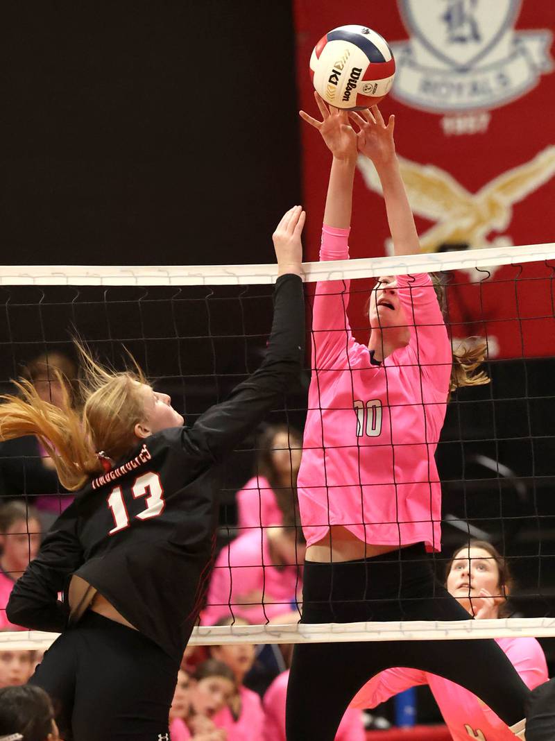 Hiawatha's Delaney Wood blocks the tip attempt of Indian Creek's Allie Peterson during their match Tuesday, Oct. 15, 2024, at Indian Creek High School in Shabbona.