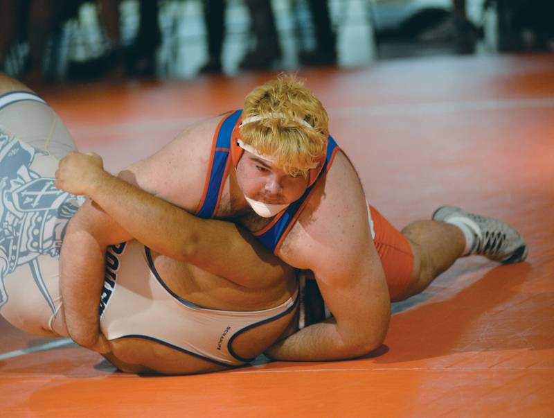 Oregon's Briggs Sellers wrestles an Ottawa Marquette opponent at 285  pounds on Tuesday, Nov. 21, 2023 at the Blackhawk Center at Oregon High School.