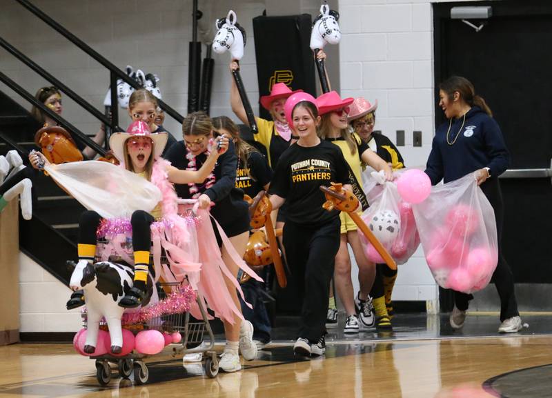 Putnam County High School sophmores walk in the shopping cart parade during the football Homecoming Pep Rally on Friday, Sept. 27, 2024 at Putnam County High School in Granville.