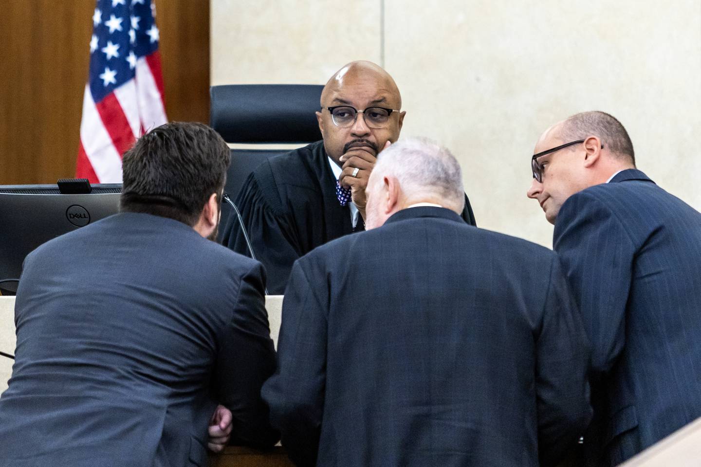 Will County Judge Vincent Cornelius has a discussion with prosecutors and defense layers during the trial of Patrick Gleason at the Will County Courthouse on Sept. 24, 2025.