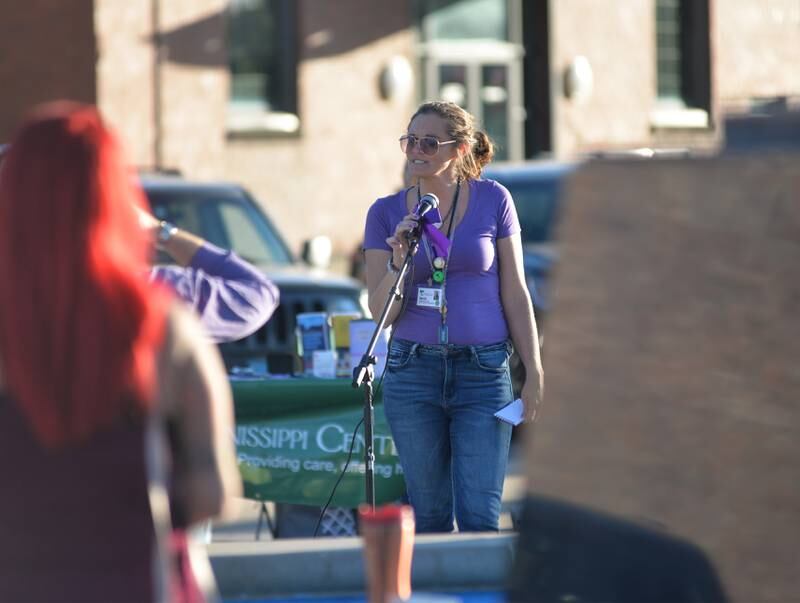Stevie Carney, with Sinnissippi Centers, speaks to the crowd at the Sauk Valley Voices of Recovery Overdose Awareness event in Dixon on Thursday, Aug. 31, 2023.