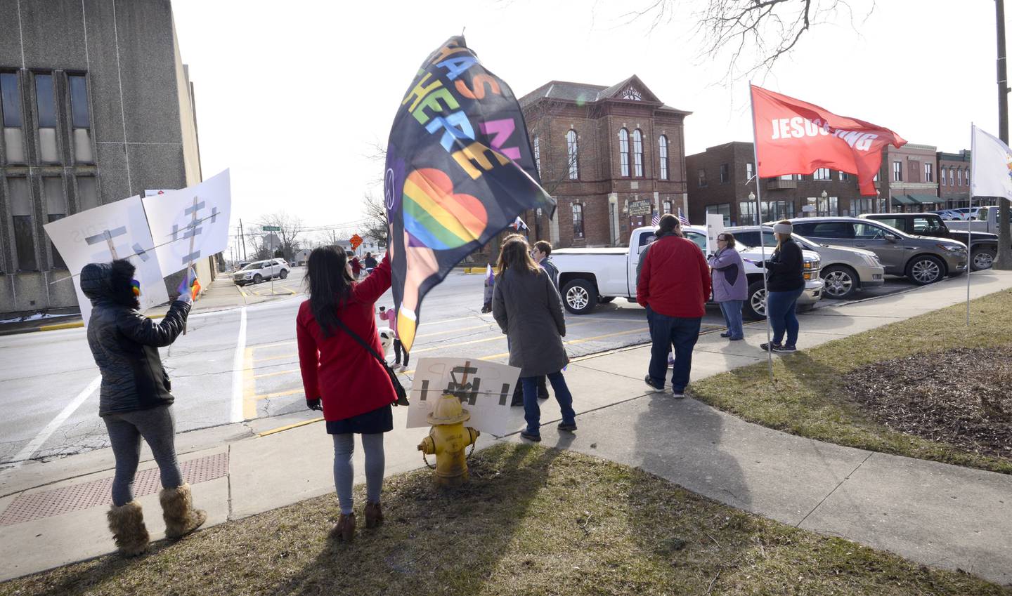 Both protesters and counter-protesters gathered in front of the Sandwich Opera House as a drag show took place on Saturday, Feb. 18, 2023.