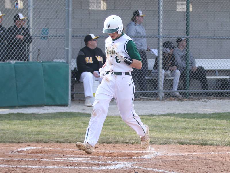 St Bede's Nathan Husser scores a run against Riverdale on Monday, March 20, 2023 at St. Bede Academy.