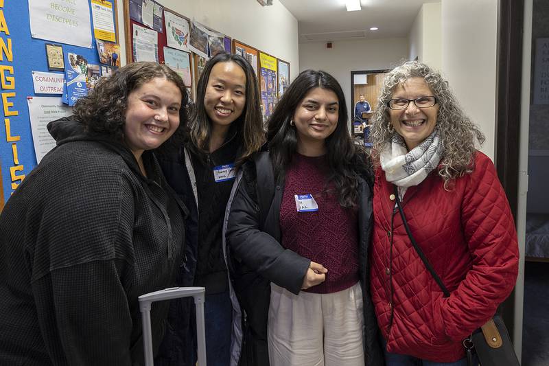 Joy Sipes (left) and Kathi Sipes (right) of Morrison will host U of C students Yumeng Wang of China (middle-left) and Saba Tjaz of Pakistan Wednesday, Nov. 27, 2024.