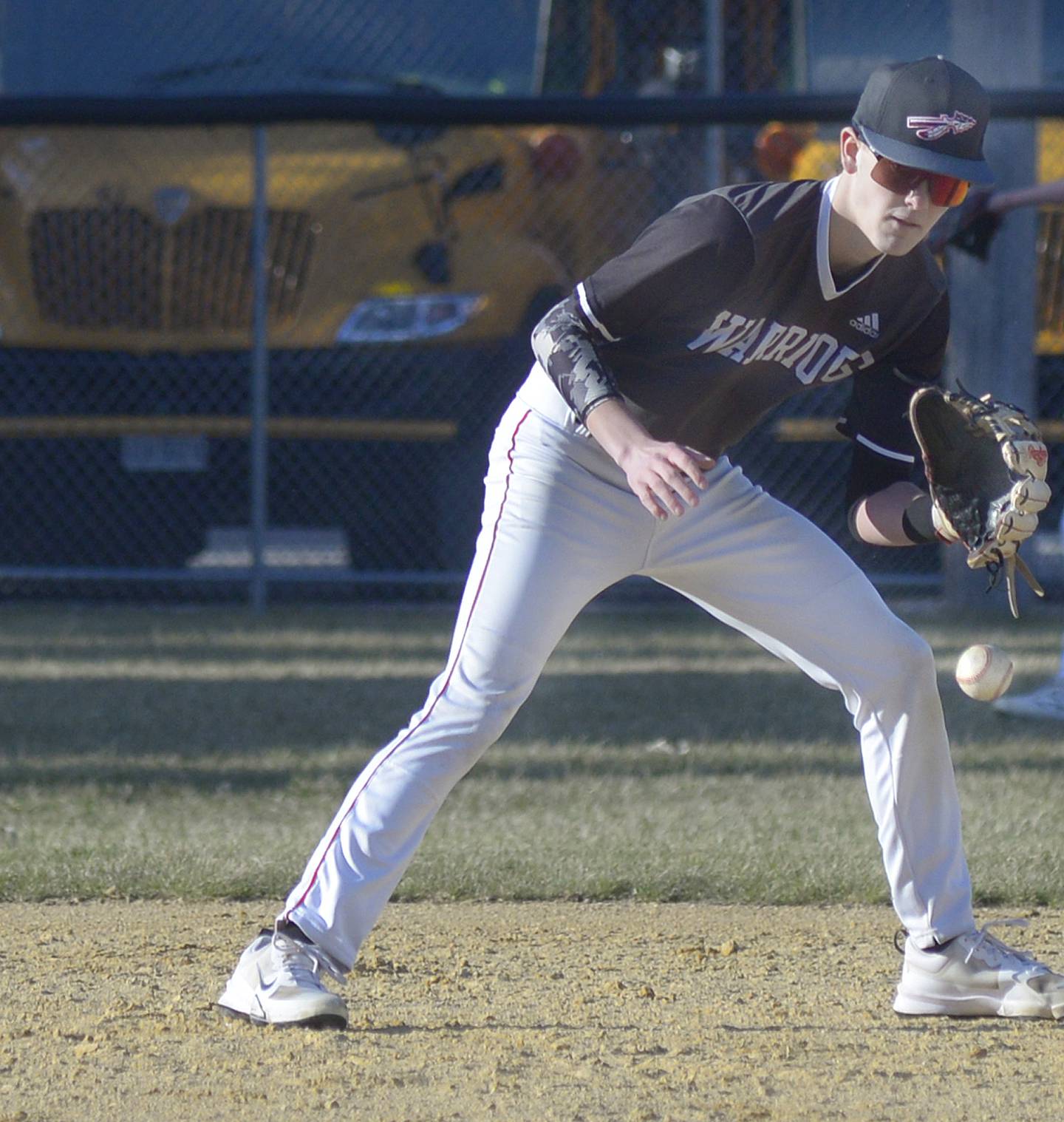 Woodland SS Nolan Price sets to scoop up a ground ball against Roanoke Benson Tuesday at Woodland.