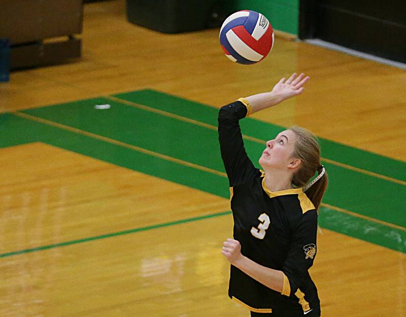 Putnam County's Megan Wasilewski serves against Henry in the Tri-County Conference Tournament on Monday, Oct. 10, 2022 in Seneca.