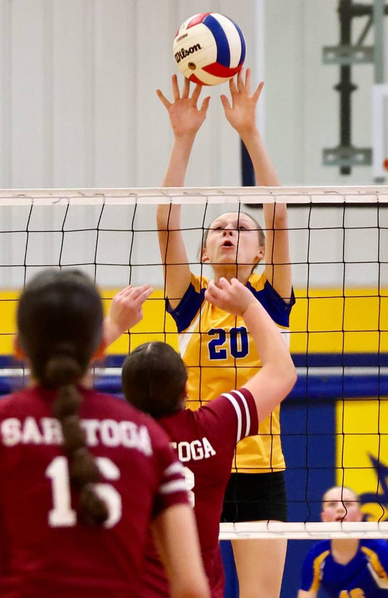 Princeton Logan's Kassie Rankin makes a block in Monday's Class 3A 8th grade sectional finals at Pannebaker Gym. The Lions fell in three sets to Morris Saratoga.