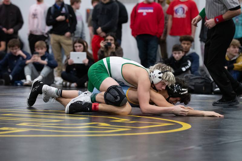 Seneca's Raiden Terry, top, and Ottawa's Wesley Janick wrestle in the 120-pound championship match during the Reed-Custer Comet Classic Wrestling Invite on Saturday, Jan 17.