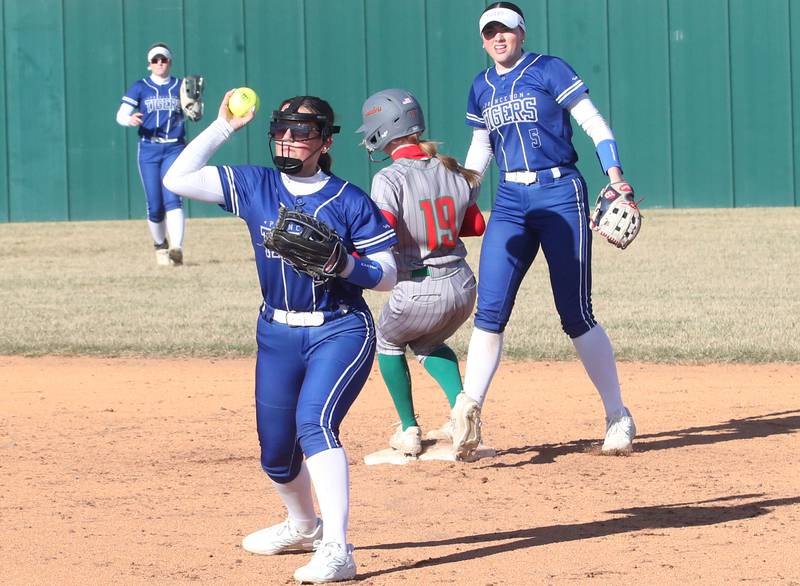 Princeton's Sylvie Rutledge throws to first base after fielding a ground ball as L-P's Lydia Steinbach takes second base while Princetons Keely Lawson stands on the bag on Tuesday, March 25, 2025 at the L-P Athletic Complex in La Salle.