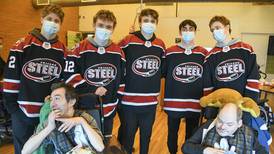 Chicago Steel visits Geneva Marklund with teddy bears
